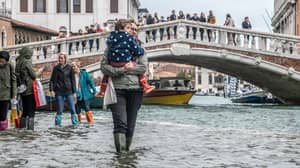 Locals Still Serve Pizza As Venice Suffers Worse Flooding In Years