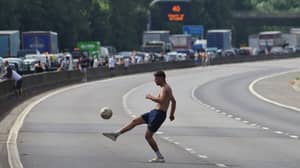 Man Plays Football On Motorway During M4 Traffic Jam