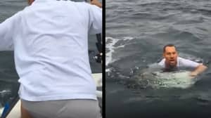 Determined Man Jumps In Sea To Catch Fish After It Unhooked Itself