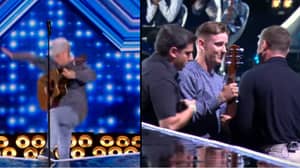 'X Factor' Contestant Falls Backwards Off Stage After Losing His Footing