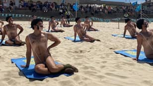 Forty Men In 'Maskinis' Crash Bondi Beach In Borat 2 Stunt