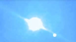 Australian UFO Hunter Claims Footage Shows 'Giant Orb Moving Into Sun'