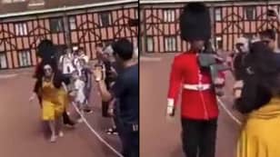 Tourist Shoved By Guardsman After She Stood In His Way During Windsor Castle Drill