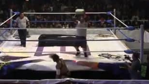 Wrestler Throws Concrete Block Onto Opponent's Head