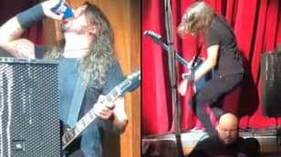 Dave Grohl Downs Beer Then Falls Off Stage During Foo Fighters Gig