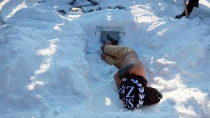 Man Buried Alive In Snow For 13 Minutes In Bizarre Valentine's Day Stunt