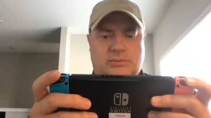 Brendan Fraser Caught Playing Nintendo Switch As Fan Waits To Interview Him