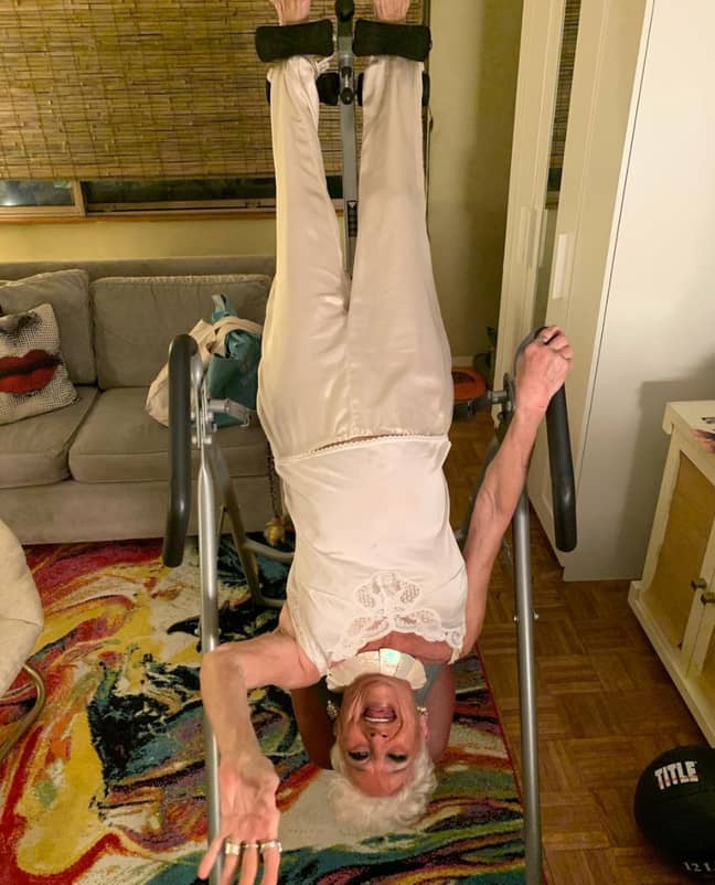 Hattie hangs upside down and uses her medicine ball to stay fit. Credit: Instagram