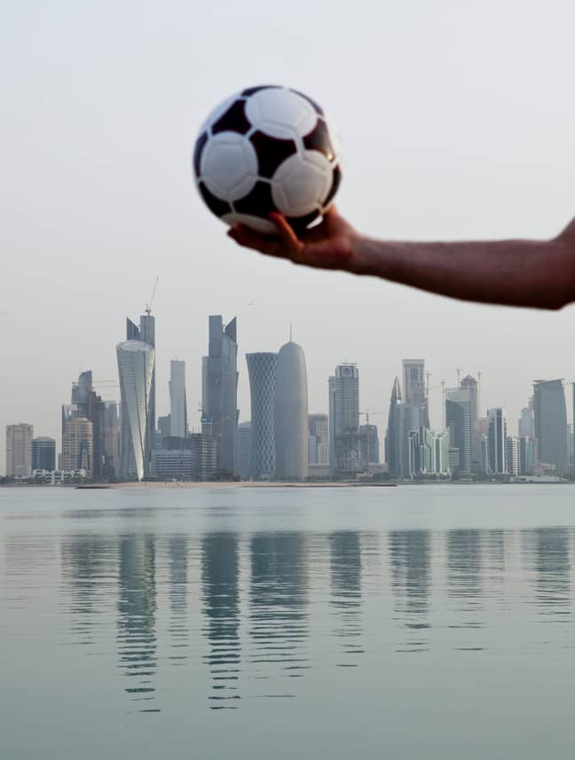A visual metaphor hangs above the city of Doha. Credit: PA