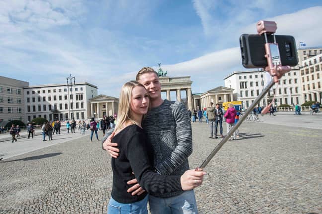 Your selfie-stick is killing Planet Earth, as well as your dignity. Credit: PA