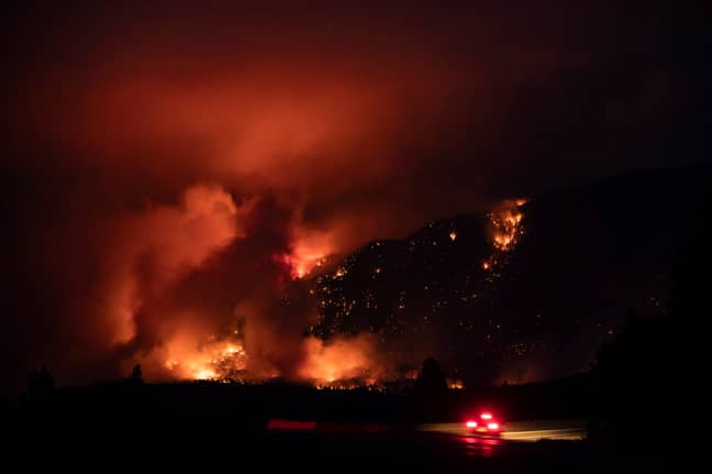 A fire rages in Lytton, Canada. Credit: PA