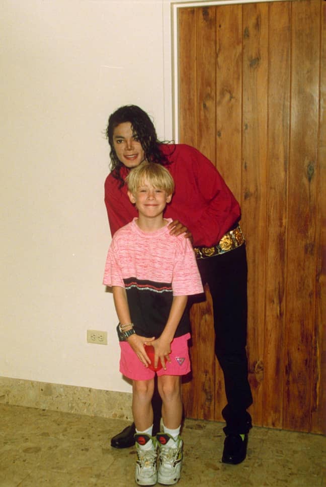 Jackson alongside a young Macaulay Culkin. Credit: Ernie McCreight/Shutterstock
