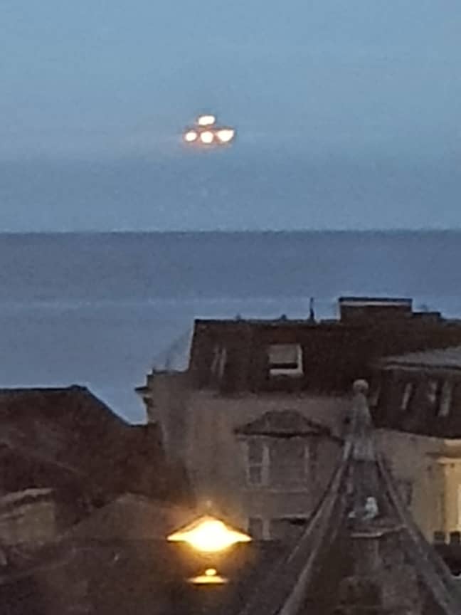Ship on the horizon, or conclusive proof of alien life? Credit: SWNS
