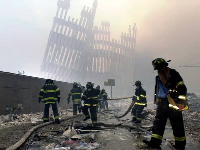 Firefighters and volunteers searching for survivors in the aftermath of the collapse of the twin towers. Credit: PA