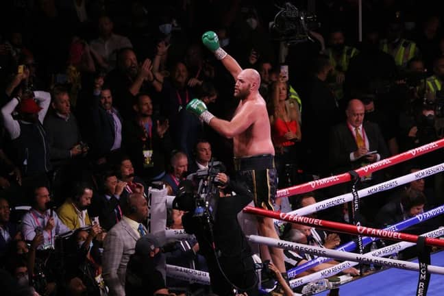 Fury celebrates retaining his WBC heavyweight belt. Credit: Alamy