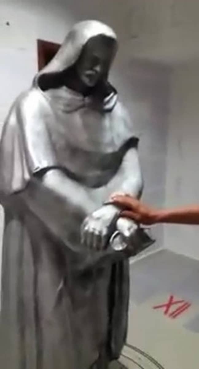 This £2,000 statue was also found in his room. Credit: Guilherme Kaminski dos Santos/Youtube