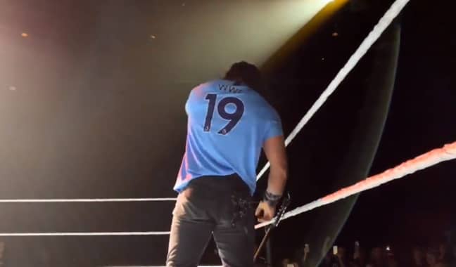 Elias shocked the crowd when he put on a City strip with 'WWE 19' across the back. Credit: WWE