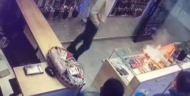 Phone turns into a fireball in repairman's hands. Credit: AsiaWire