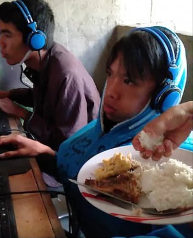 The concerned mum has to feed her son while he plays video games as he won't leave the screen. Credit: Viral Press