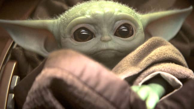 Baby Yoda here, being cute. Credit: Disney
