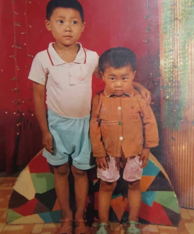 Mr Hao, right, was only eight years old when he was abducted. Credit: AsiaWire