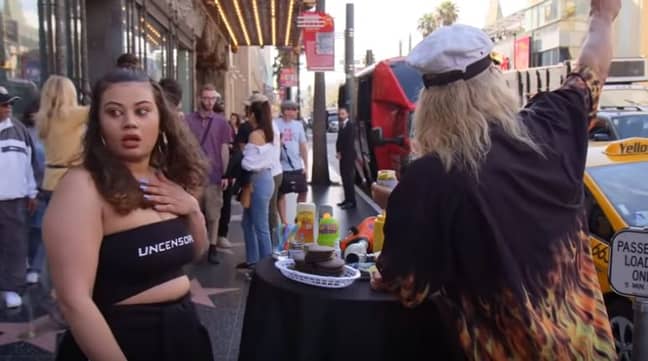 The moment Snoop Dogg started shouting from a coach. Credit: Jimmy Kimmel Live/ABC