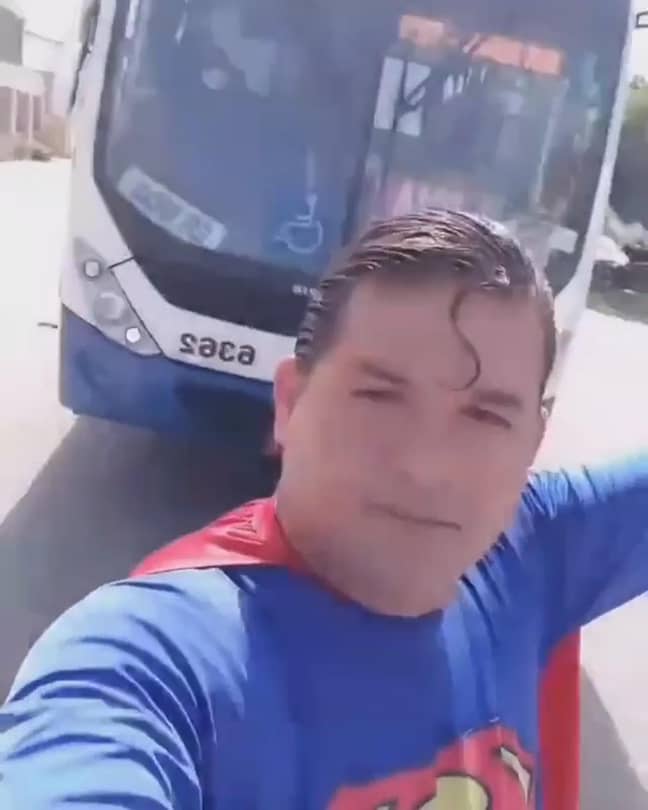 Stopping the bus... or trying to anyway. Credit: @kaleusuperman/Newsflash