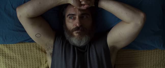 You Were Never Really Here is similar to Joker in many ways - though he is much less scrawny in the former. Credit: StudioCanal