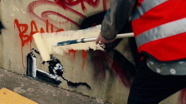 Walken destroying the Banksy painting. Credit: BBC