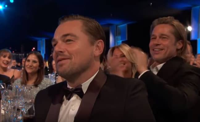 Can we appreciate how happy Brad is in the background. Credit: TNT