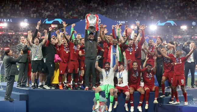 Liverpool manager Jurgen Klopp lifts the UEFA Champions League Trophy. Credit: PA