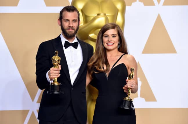 Rachel and Chris with their Oscar awards. Credit: PA