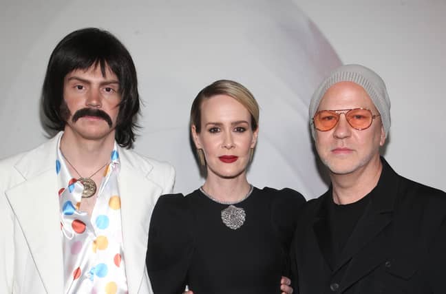Evan Peters (in a silly costume), Sarah Paulson and Ryan Murphy. Credit: PA