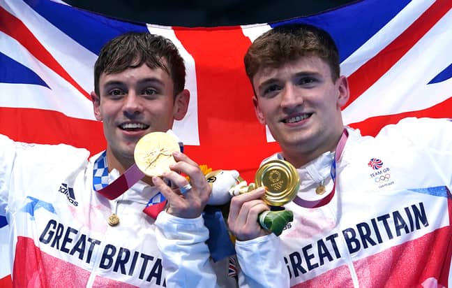 Tom Daley and Matty Lee winning gold medals for the men's 10m synchronised dive. (Credit: PA)