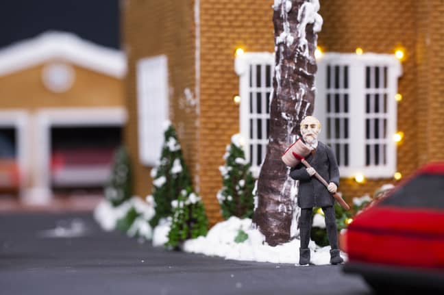 Tiny icing figures decorate the house (Credit: PA)
