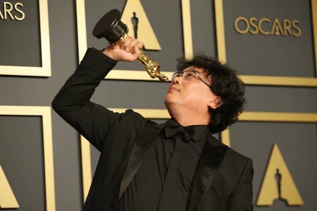 Bong Joon-ho with one of his many Oscars. Credit: PA