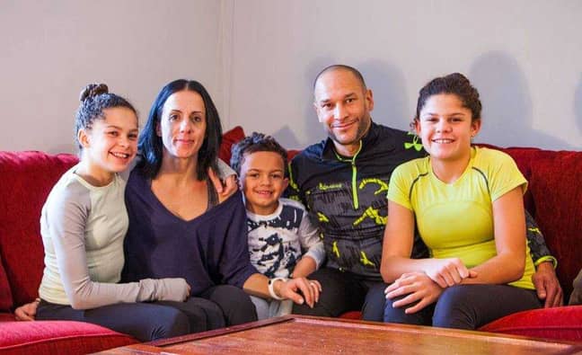 John DePass, 46, with wife Dora, 45, and their three children Michaila, 15, Sierra, 14 and Aniken, 7. Credit: Kennedy News and Media