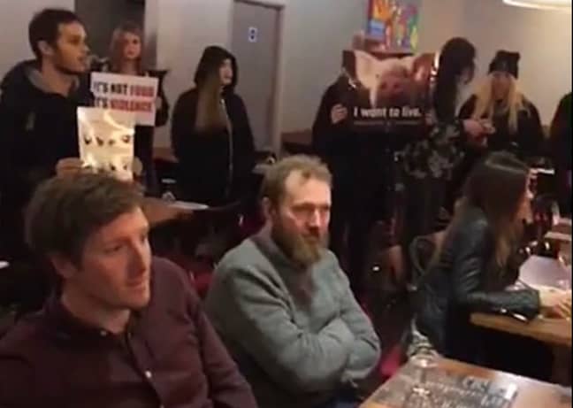 Most diners appear to be unaffected by the vegan rally in Touro Steakhouse in Brighton. Credit: Triangle News