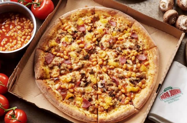 Papa John's released its English Breakfast pizza today - complete with Heinz Beanz. Credit: Papa John's
