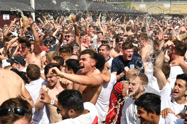 England fans celebrating Harry Maguire's goal. Credit: PA