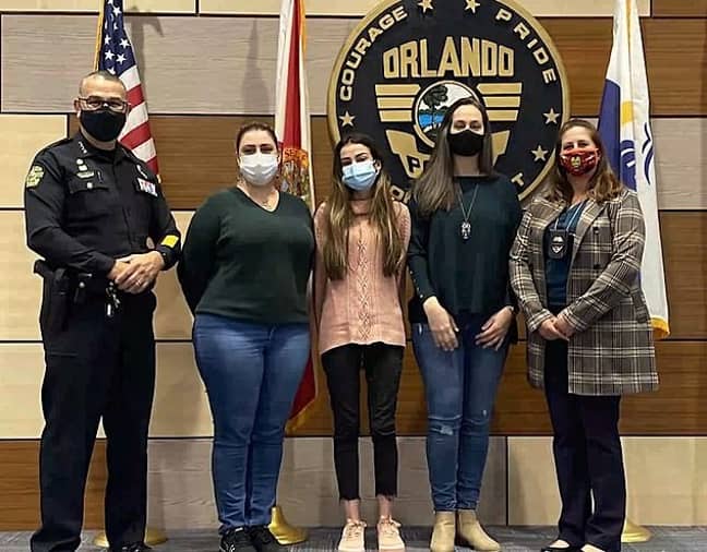 Flaviane Carvalho (second right). Credit: Orlando Police Department