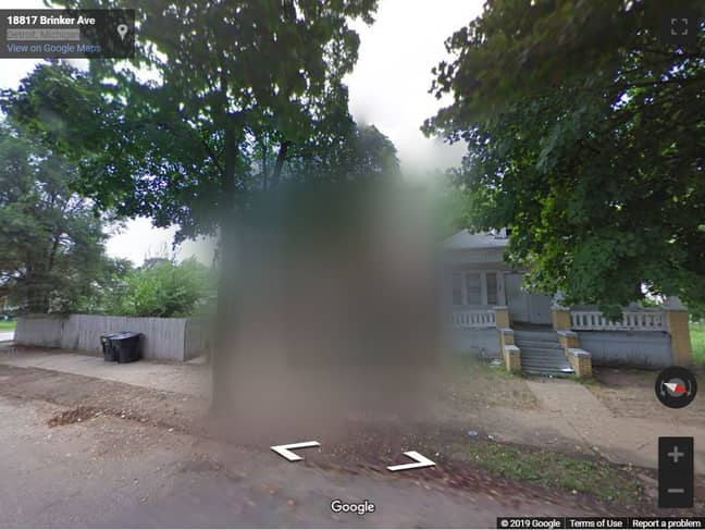 The house where the men stood is now blurred out on Street View. Credit: Google Maps
