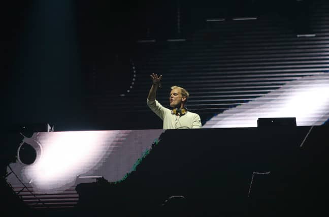Avicii performing on stage. Credit: PA