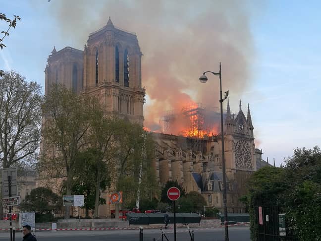 The 850-year-old monument was engulfed by flames, destroying the iconic spire and roof. Credit: PA