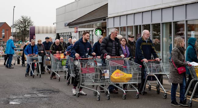 Supermarkets are now seeing lengthy queues as many chains adjust their hours amidst the coronavirus pandemic. Credit: PA