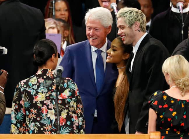 Clinton posing for a picture with Ariana and her fiance, Pete Davidson. Credit: PA