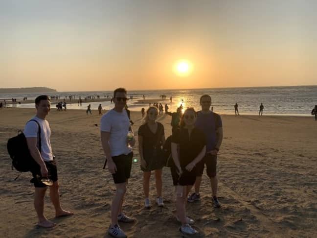 The team enjoying the sunset at a beach. Credit: News Dog Media