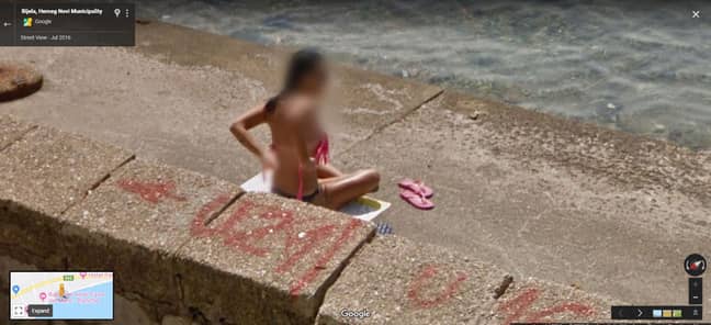 Do you need help with that? Woman Tries To Cover Up From Google Maps camera. Credit: Google Maps