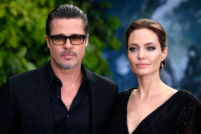 Angelina Jolie and Brad Pitt and the premiere of Maleficent in 2014. (Credit: PA)