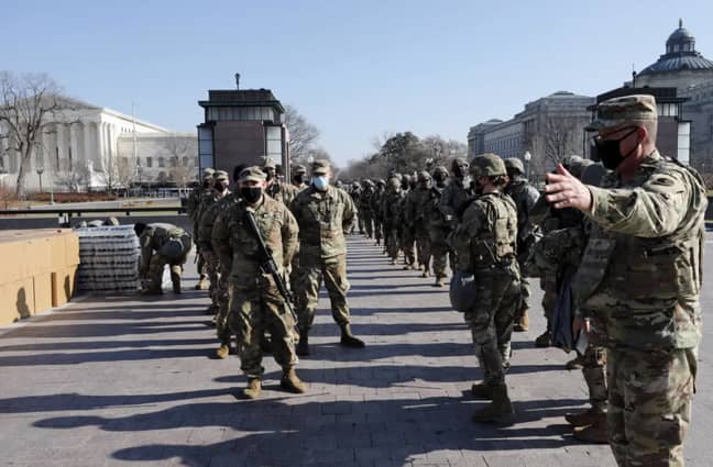 Members of the National Guard arrive on Capitol Hill during the Impeachment debate. Credit: PA
